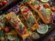 File de somon la cuptor cu lămâie, ierburi și capere pentru fileuri suculente